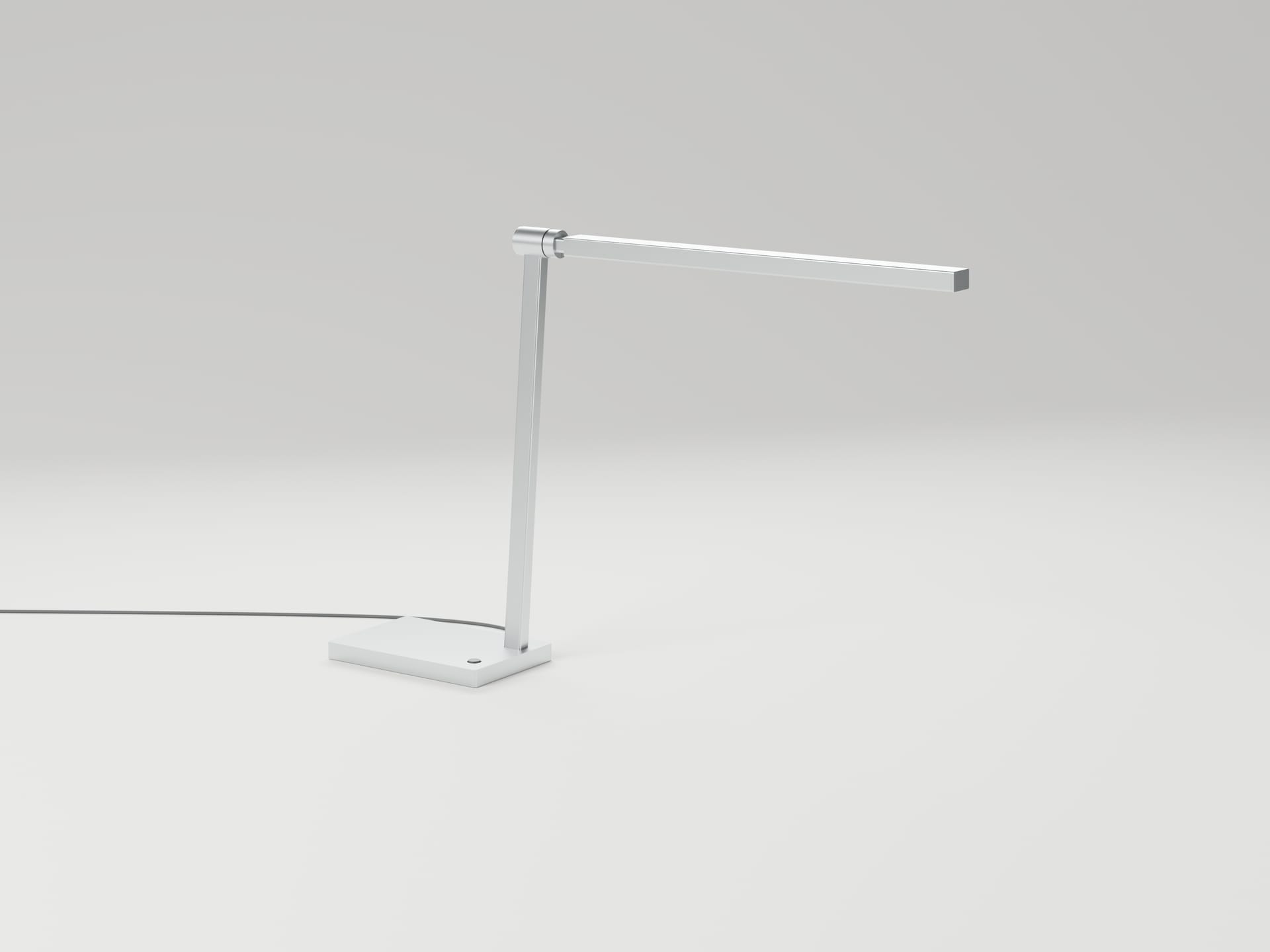 L01: a slim white base, a support leaning back a few degrees, and a long square-section light head extending from a cylindrical hinge.