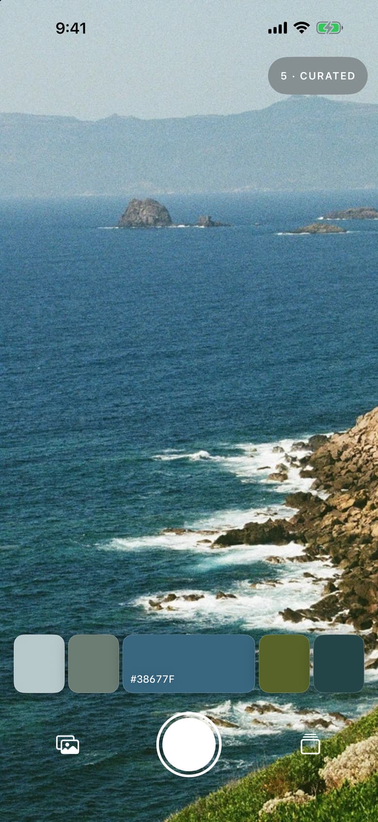 Palet camera view of a sea coast with five swatches along the bottom, the middle one showing its hex value